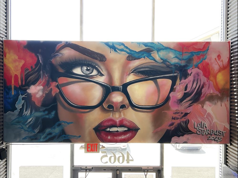 Painting on top of the entrance of our Houston Gym