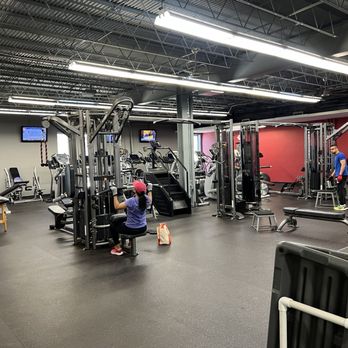 Woman working out in our Houston gym