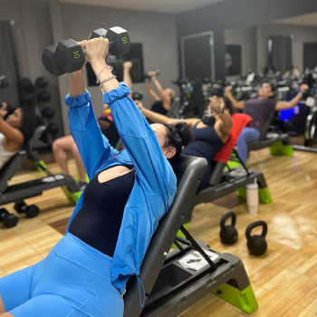 Inside our Houston gym with strength training equipment